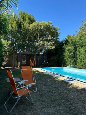 Casa con pileta y patio privado en Ibarlucea